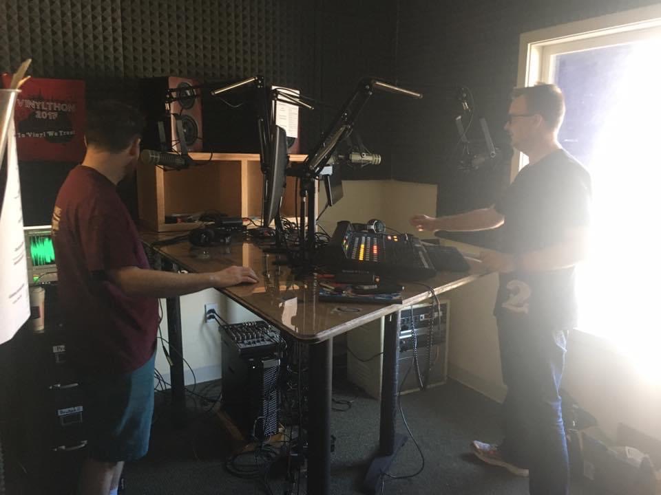 People standing in the WVCW studio